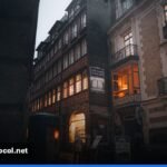 Closed French shop under curfew lights on a Paris street