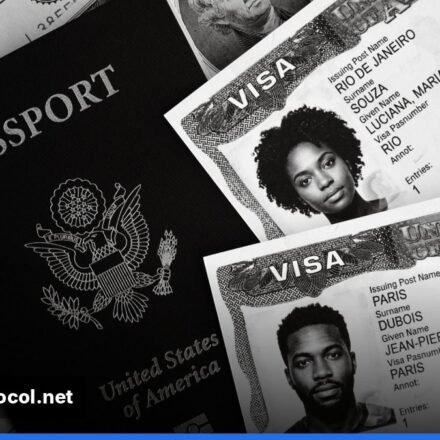 Passport, application forms and documents laid out on a desk for a UK visa application