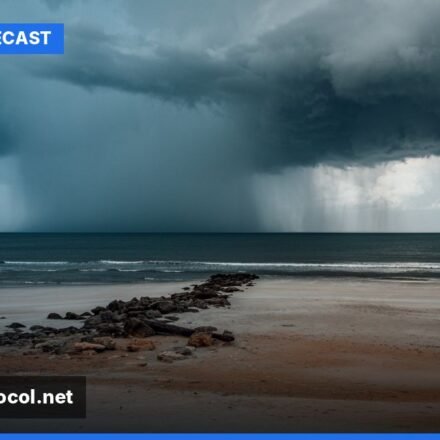 A stormy beach scene in Jacksonville, Florida, with rough waves and dark clouds overhead, reflecting the challenging weather conditions.