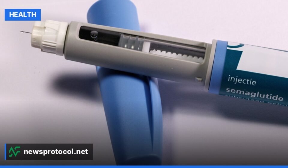A weekly weight loss injection pen and its packaging on a plain clinical surface