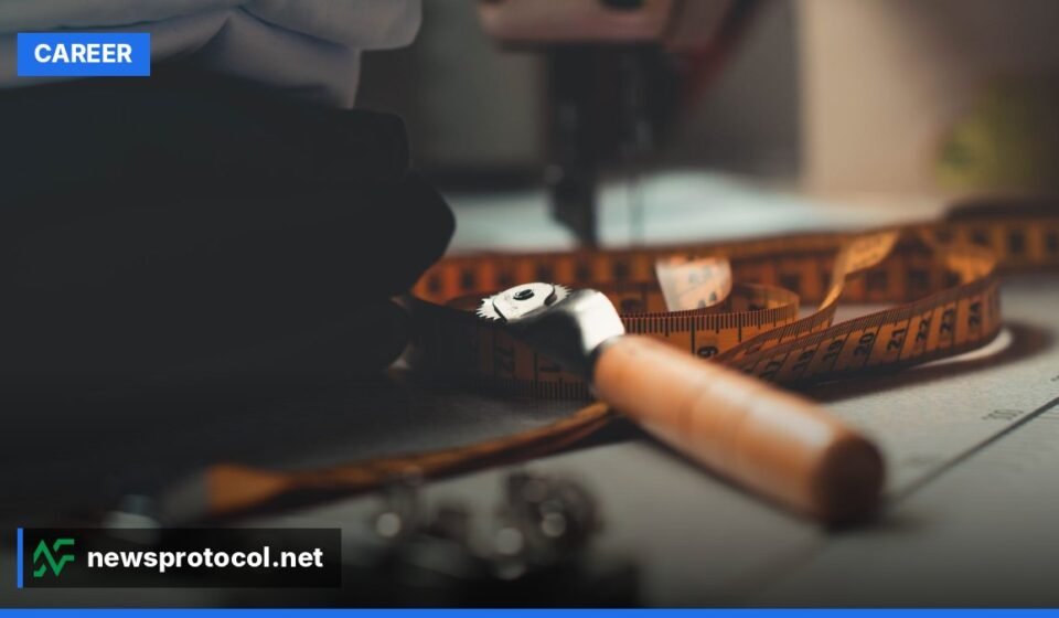 A bustling costume workshop with dressmakers cutting fabric and sewing machines in action.