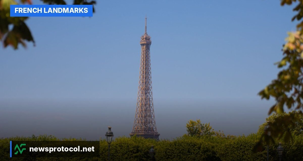 The Eiffel Tower stands tall against a clear sky in Paris, symbolizing France's iconic status.