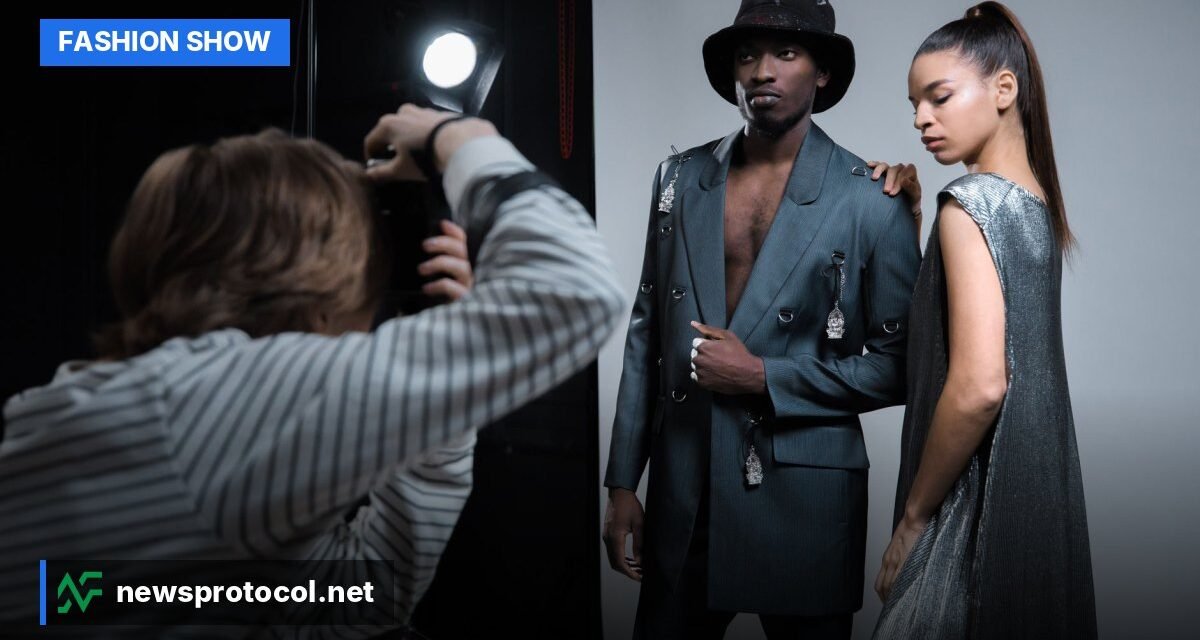 Models preparing backstage at a fashion show, adjusting outfits and makeup before walking the runway.